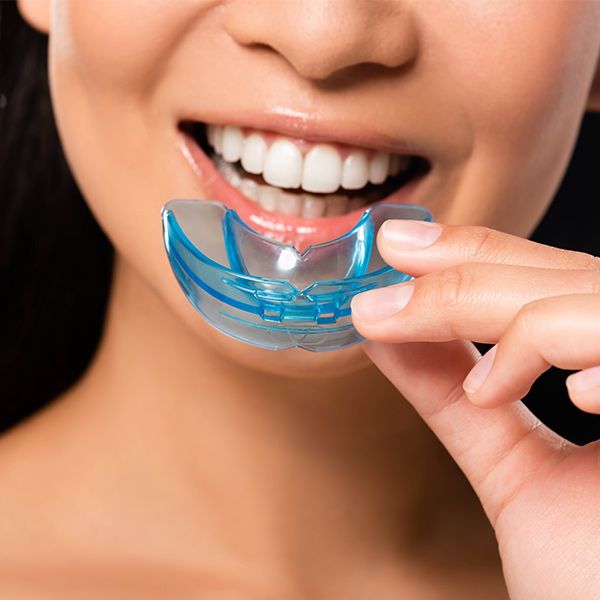 Woman wearing Myobrace device